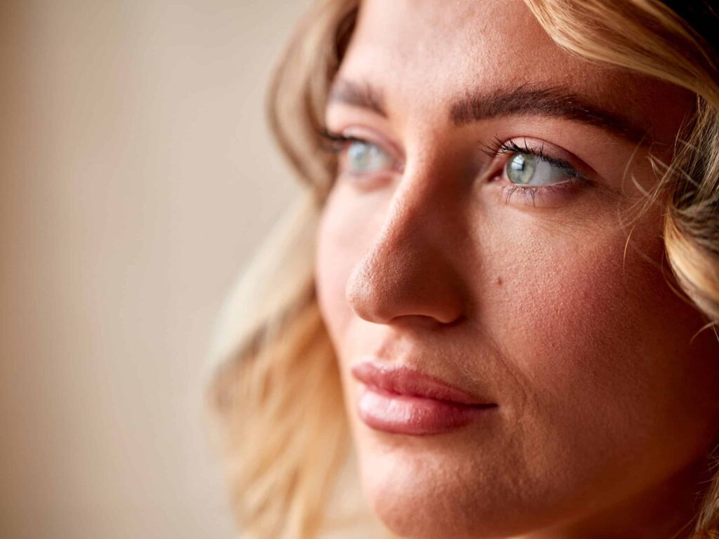 studio portrait shot face and eyes of confident natural
